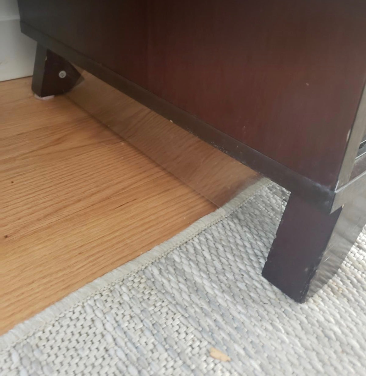 Tebeary blockers installed beneath a sofa